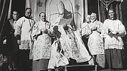 Pope Pius XII in 1950 proclaiming the dogma of the Assumption of Mary