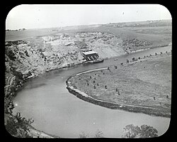 Sand being loaded onto a barge on the Maribyrnong River, Essendon West, around 1910