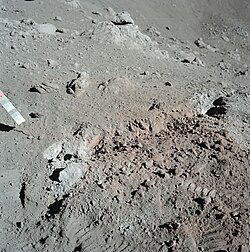Orange Taurus–Littrow soil discovered on the Apollo 17 mission. The orange color is due to microscopic glass beads created by volcanic processes earlier in the Moon's history.