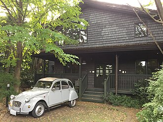 A house with a car in front