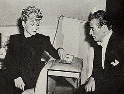 Wayne playing chess with Marlene Dietrich, 1943