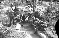 German soldiers drawing water