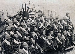 Japanese Marines preparing to land in Anqing, China, in June 1938