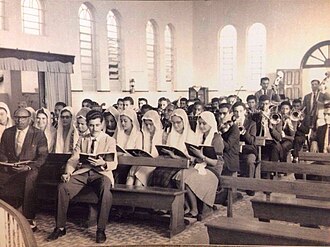Pentecostal worshippers belonging to the Christian Congregation in Brazil, with women wearing modest dress and headcoverings (1950)