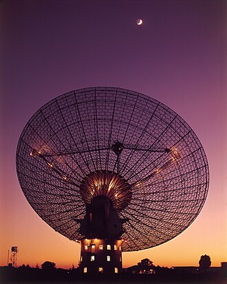 The 64-meter radio telescope at Parkes Observatory as seen in 1969, when it was used to receive live televised video from Apollo 11