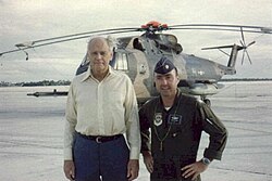 Lindbergh with Air Force Maj. Bruce Ware in 1972 in front of a Sikorsky S-61R, following Ware's air rescue of Lindbergh in the Philippines