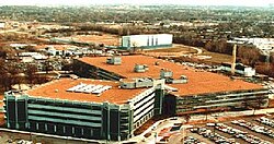 MPRC's former location in Overland, Missouri, with the Army HRC building attached. The white building in the background is the U.S. Army Publications Distribution Center.