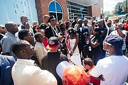 Protesters gather at the Ferguson police department