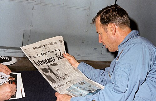Nobody believes me, but during this six-day odyssey, we had no idea what an impression Apollo 13 made on the people of Earth. We never dreamed a billion people were following us on television and radio, and reading about us in banner headlines of every newspaper published. We still missed the point on board the carrier Iwo Jima, which picked us up, because the sailors had been as remote from the media as we were. Only when we reached Honolulu did we comprehend our impact: there we found President Nixon and [NASA Administrator] Dr. Paine to meet us, along with my wife Marilyn, Fred's wife Mary (who, being pregnant, also had a doctor along just in case), and bachelor Jack's parents, in lieu of his usual airline stewardesses.— Jim Lovell[138]