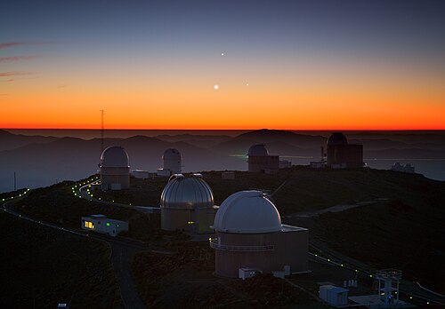 Jupiter (top), Venus (lower left), and Mercury (lower right) above La Silla Observatory, Chile (May 26, 2013)[5]