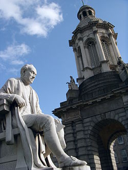 Statue of former Provost George Salmon (by John Hughes) and the Campanile, both in Parliament Square