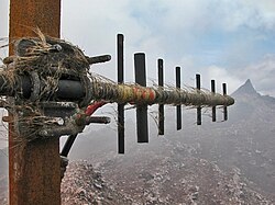 Pele's hair caught on a radio antenna mounted on the south rim of Puʻu ʻŌʻō, Hawaiʻi, July 22, 2005