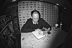 Gibson signing one of his novels in 2010