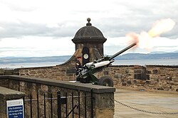 The One O'Clock Gun being fired from Mill's Mount Battery