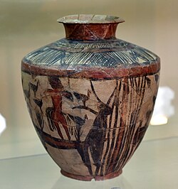 Polychrome painted jar, geometric designs and animals, the so-called "Scarlet Ware". From Tell Abu Qasim at Hamrin Basin, Iraq. 2800–2600 BCE. Iraq Museum