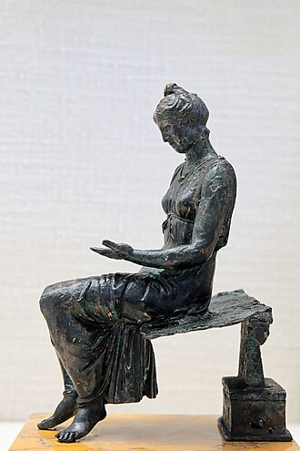 Bronze statuette of a young woman reading (latter 1st century)