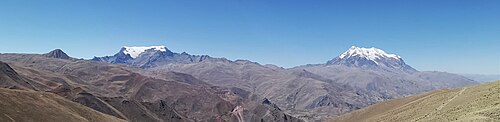 Mururata and Illimani in Bolivia, two prominent peaks formed by the tectonic uplift caused by the Andean orogeny and plate subduction.