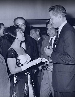 Heston speaking to Magda during the 11th Berlin International Film Festival, 1961[2]