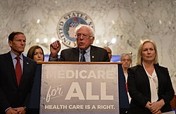 Sept. 13, 2017. Senator Bernie Sanders (I–VT) speaks in favor of Medicare for All. Senator Kirsten Gillibrand (D–NY) is standing to his left.