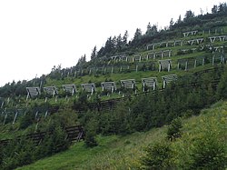 Snow fences in Switzerland during summer.