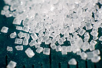 Grains of white sugar