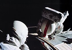 Ken Mattingly performing his deep-space EVA, retrieving film cassettes from the CSM's exterior