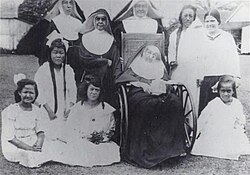Mother Marianne Cope (in the wheelchair) only a few days before she died