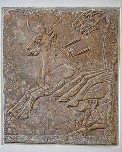 Refined low-relief section of a bull-hunt frieze from Nineveh, alabaster, c. 695 BC (Pergamon Museum, Berlin)