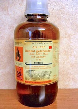 A bottle of benzene. The warnings show benzene is a toxic and flammable liquid.