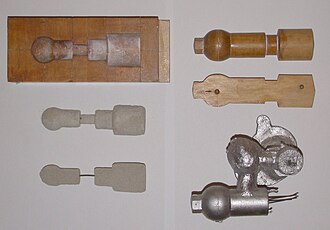 Left: Corebox, with resulting (wire reinforced) cores directly below. Right:- Pattern (used with the core) and the resulting casting below (the wires are from the remains of the core)
