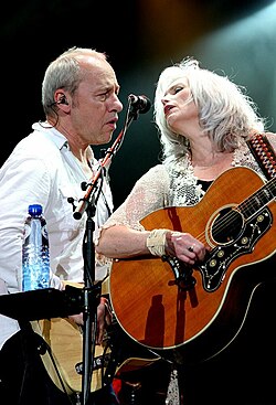 In 2006, Harris joined Mark Knopfler of Dire Straits fame to record All the Roadrunning. Pictured is the pair performing live in The Netherlands.