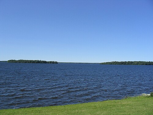 This picture was taken from the Cicero Yacht Club parking lot. Two islands can be seen. Frenchman Island on the left and Dunham Island on the right.