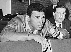 Ali watches replay of his March 1966 title fight against Henry Cooper.[53]