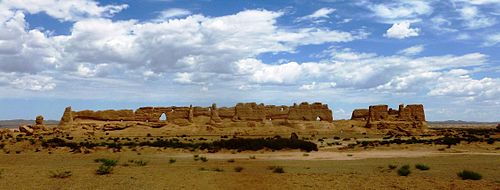 These rammed earth ruins of a granary in Hecang Fortress (河仓城; Hécāng chéng), located approximately 11 km (7 mi) northeast of the Western Han-era Yumen Pass, were built during the Western Han (202 BC – 9 AD) and was significantly rebuilt during the Western Jin (280–316 AD).[67]