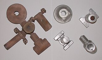 Two sets of raw castings (bronze and aluminium), demonstrating the characteristic granular surface texture before finishing. In contemporary design, this "sand skin" is often preserved for its aesthetic value.