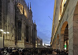 Corso Vittorio Emanuele II, one of the main shopping streets in Milan, with the Duomo at left and La Rinascente department store at right