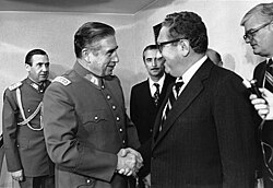 Chilean leader Augusto Pinochet shaking hands with U.S. Secretary of State Henry Kissinger in 1976