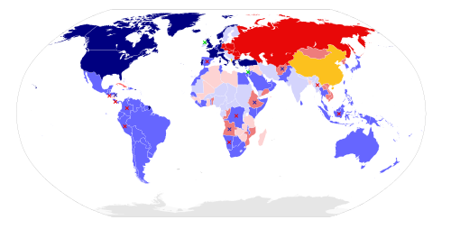 Cold War alliances in 1980, with NATO and other U.S. allies in blue, the Warsaw Pact and allies of the Soviet Union in red or pink, China and its allies in yellow, and non-aligned nations in light blue