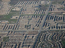 Sprawl in Milton, Ontario. This photograph is an example of Canadian exurban development, though recently attempts are made to reduce this type of development in many major cities.