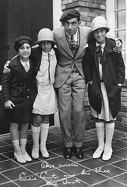 Cantor and three of his daughters strike a pose in 1926 to promote his first film, Kid Boots, and children's shoes.