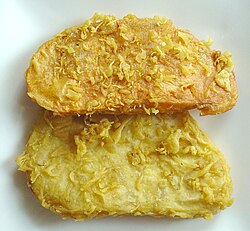Yam and sweet potato fritters in Malaysia. Fritters are a type of kuih cucur in the country