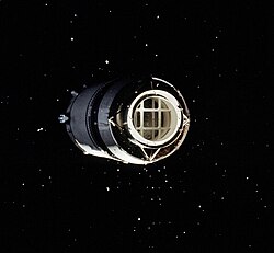 Apollo 8 S-IVB rocket stage shortly after separation. The LM test article, a circular boilerplate model of the LM, is visible with four triangular legs connecting it to the stage.