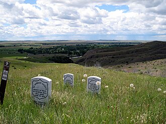 Memorial markers for three Arikara scouts — from left, Sgt. Bobtail Bull, Bloody Knife, and Little Brave — at Custer National Cemetery