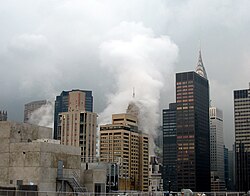 A jet of steam rising higher than the Chrysler Building during the 2007 New York City steam explosion