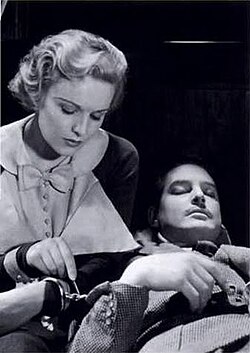 Madeleine Carroll (the archetypal "Hitchcock blonde") and Robert Donat in The 39 Steps (1935)