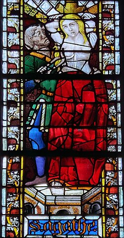 St Agatha as depicted in a stained glass window in Rouen Cathedral