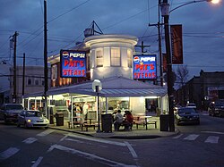 Pat's King of Steaks in South Philadelphia is widely credited with inventing the cheesesteak in 1933.[232]