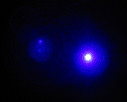 Violet light from a helium cadmium metal vapor laser. The highly monochromatic color arises from the 441.563 nm transition line of cadmium.