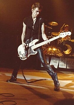 Simonon performing at the Palladium in 1979. Simonon would smash his bass against the stage later during this performance; a photograph of the event became the cover of London Calling.