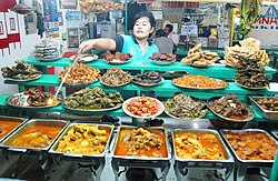 An array of Nasi kapau dishes, Minangkabau Bukittinggi cuisine.